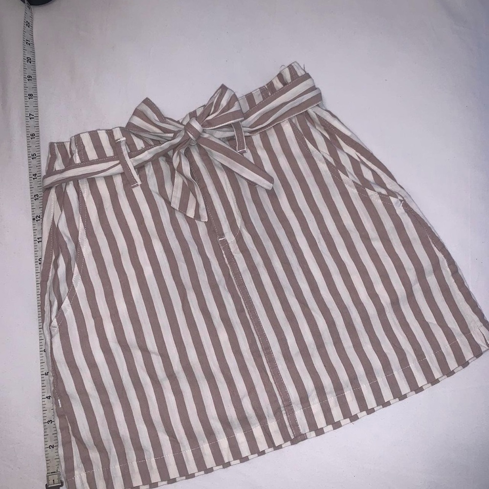 Striped cream and beige mini skirt with bow 
Barely worn